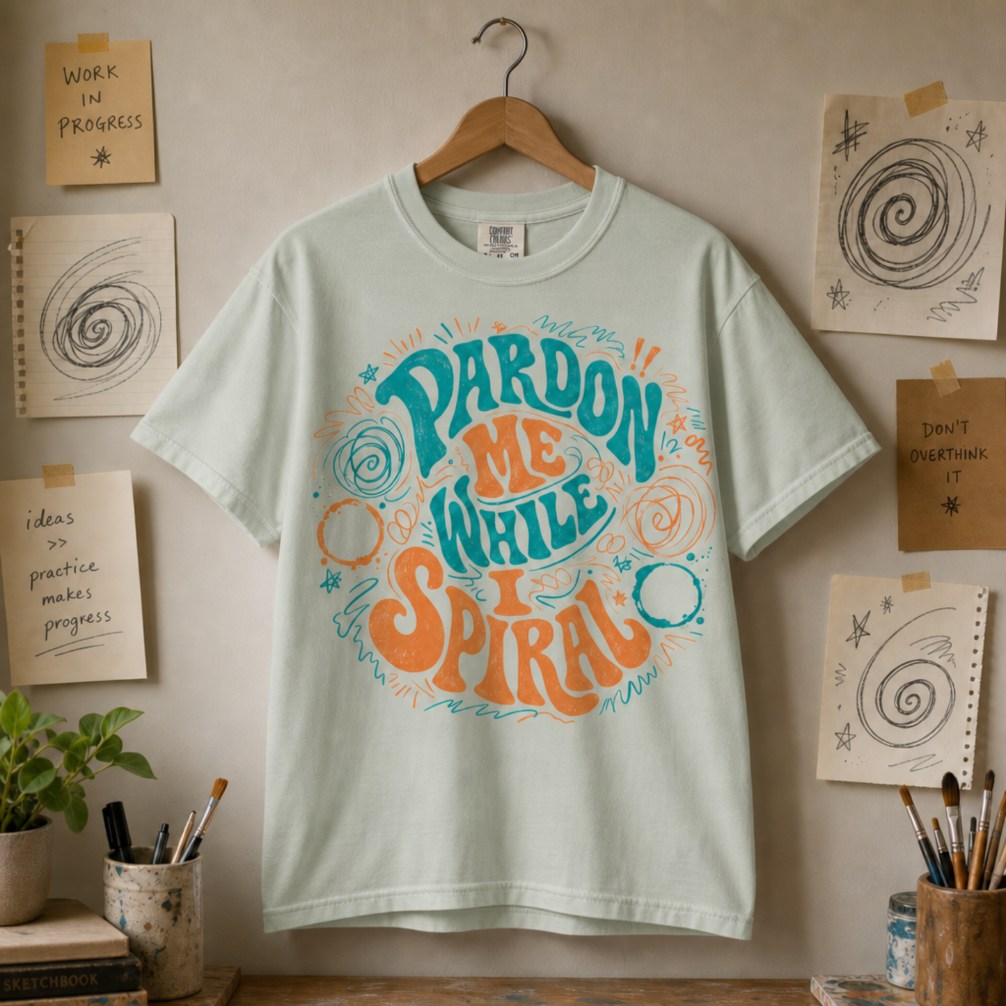 Pardon Me While I Spiral Graphic Tee